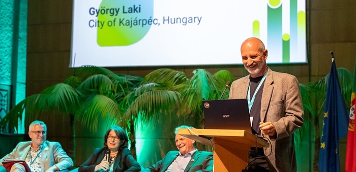 Man giving speech on stage