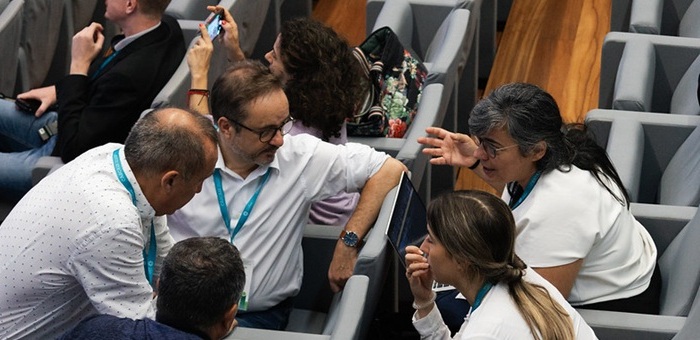 Five people talking in the audience