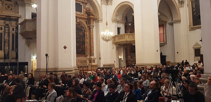 Conference audience in a historic church
